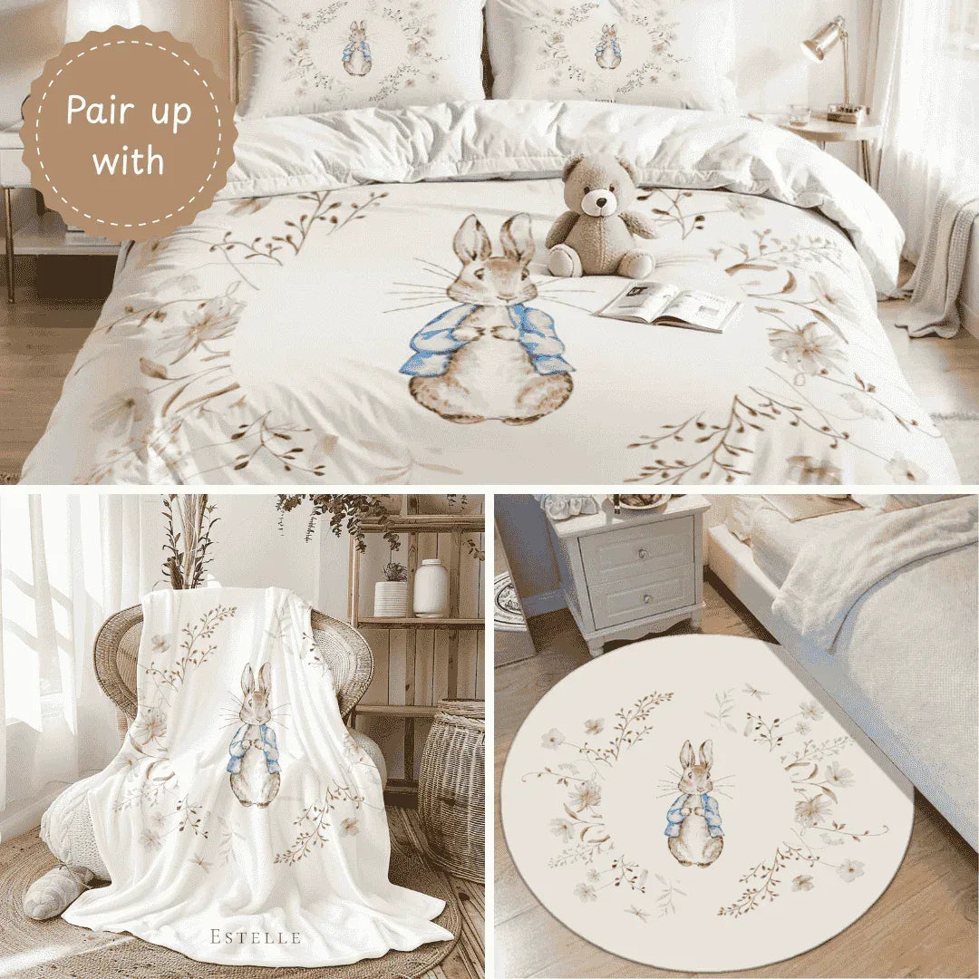 Cohesive Bunny nursery theme set including blanket, rug, and bedding decor.