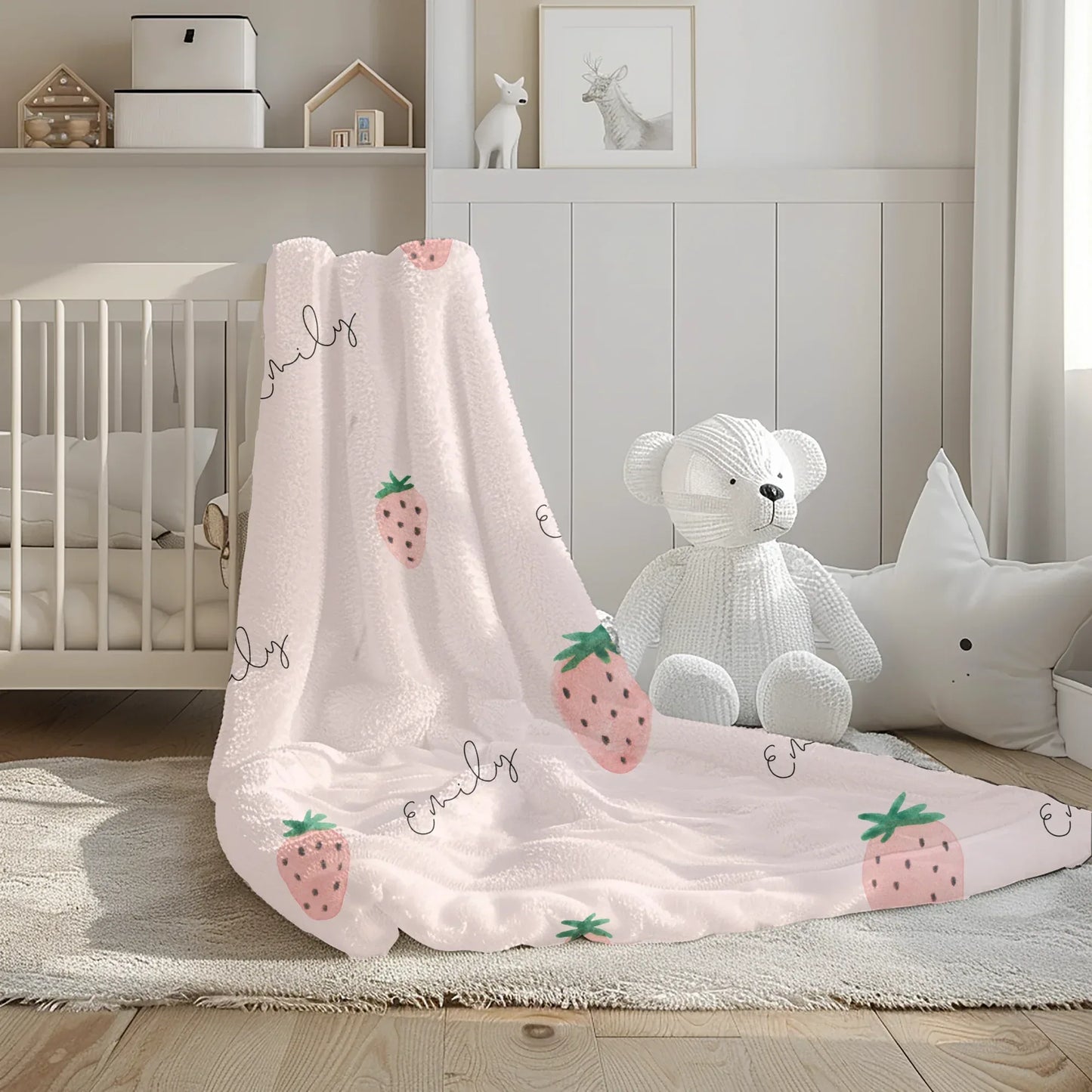 Custom baby name text on personalized strawberry theme baby blanket.