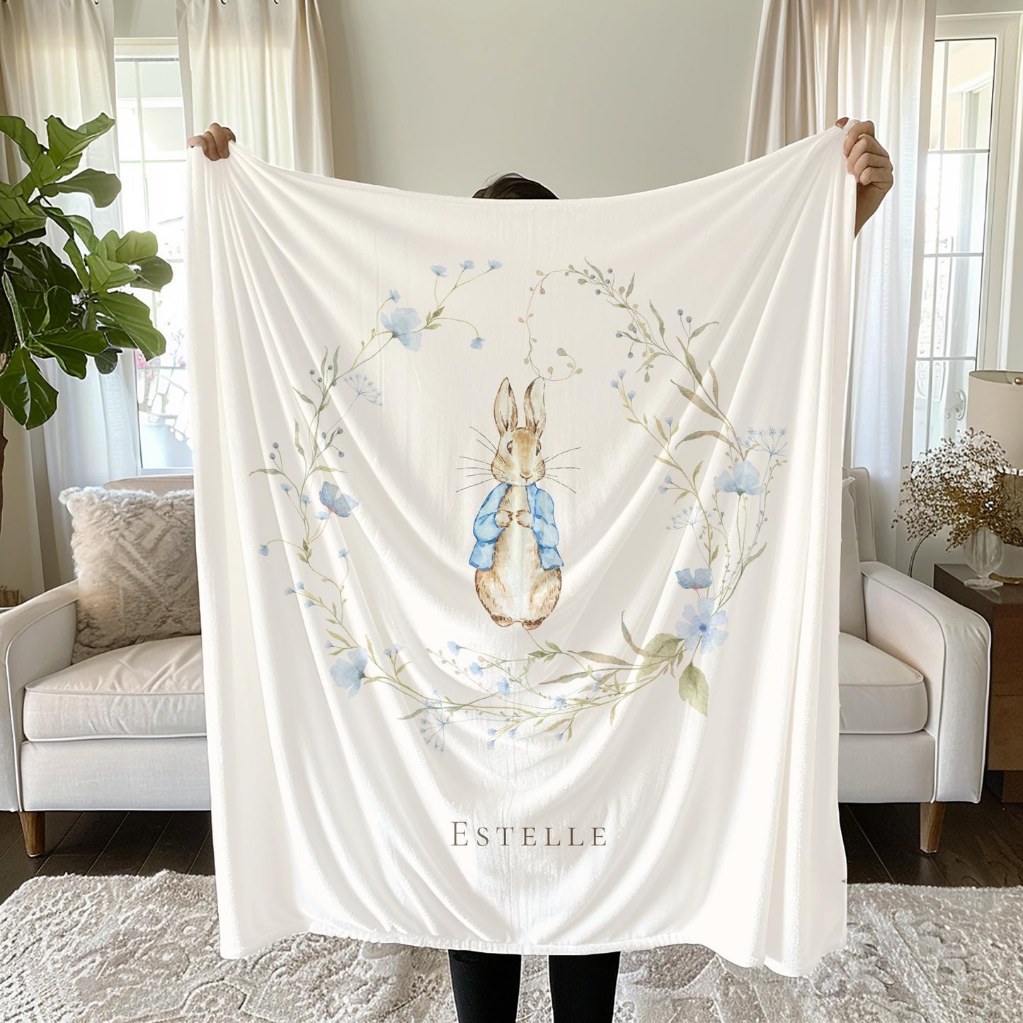 Vintage floral rabbit blanket styled in nursery decor, sanctuary theme nursery inspiration.