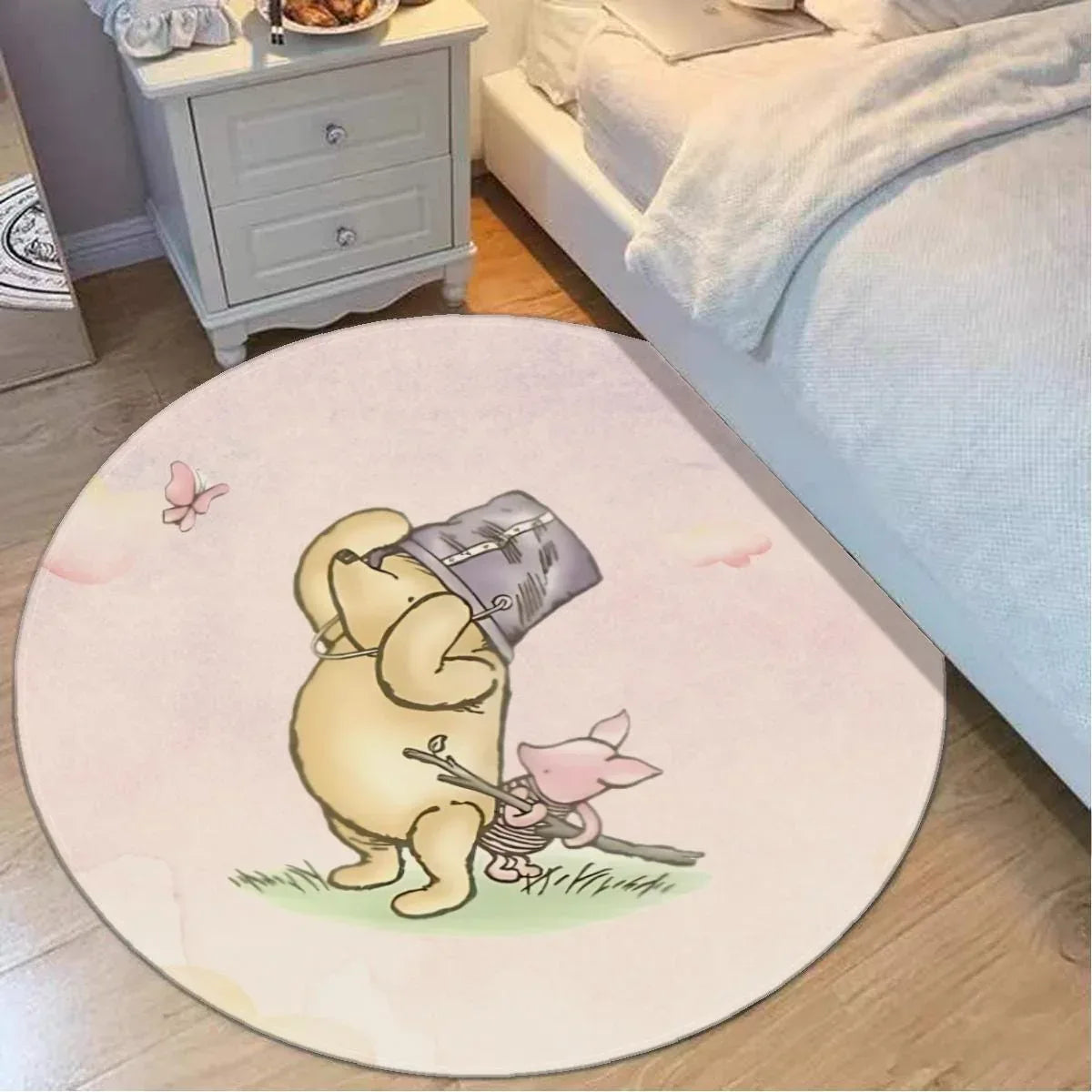 Classic Winnie the Pooh and Piglet round nursery rug, soft floor decor for baby.