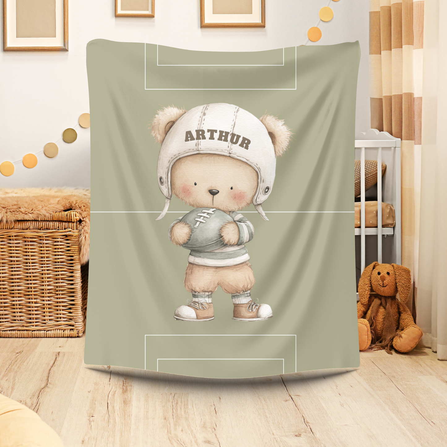 American Football Bear blanket styled in a fun, sports-themed baby nursery.