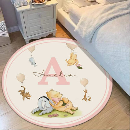 Personalized Winnie the Pooh nursery rug, soft round floor mat with custom name for baby's storybook nursery decor.