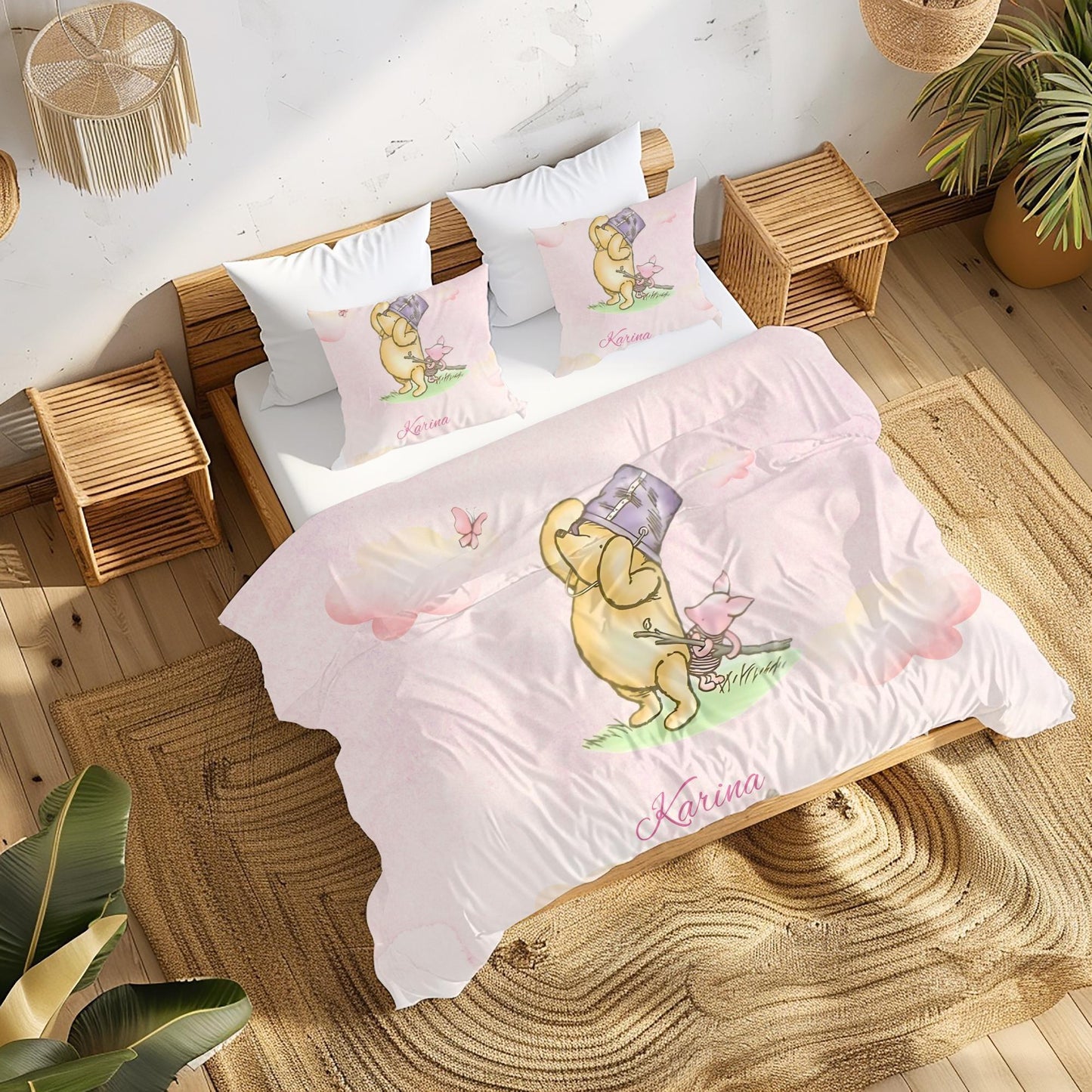 Close-up of soft fabric texture on Pooh and Piglet nursery bedding set.