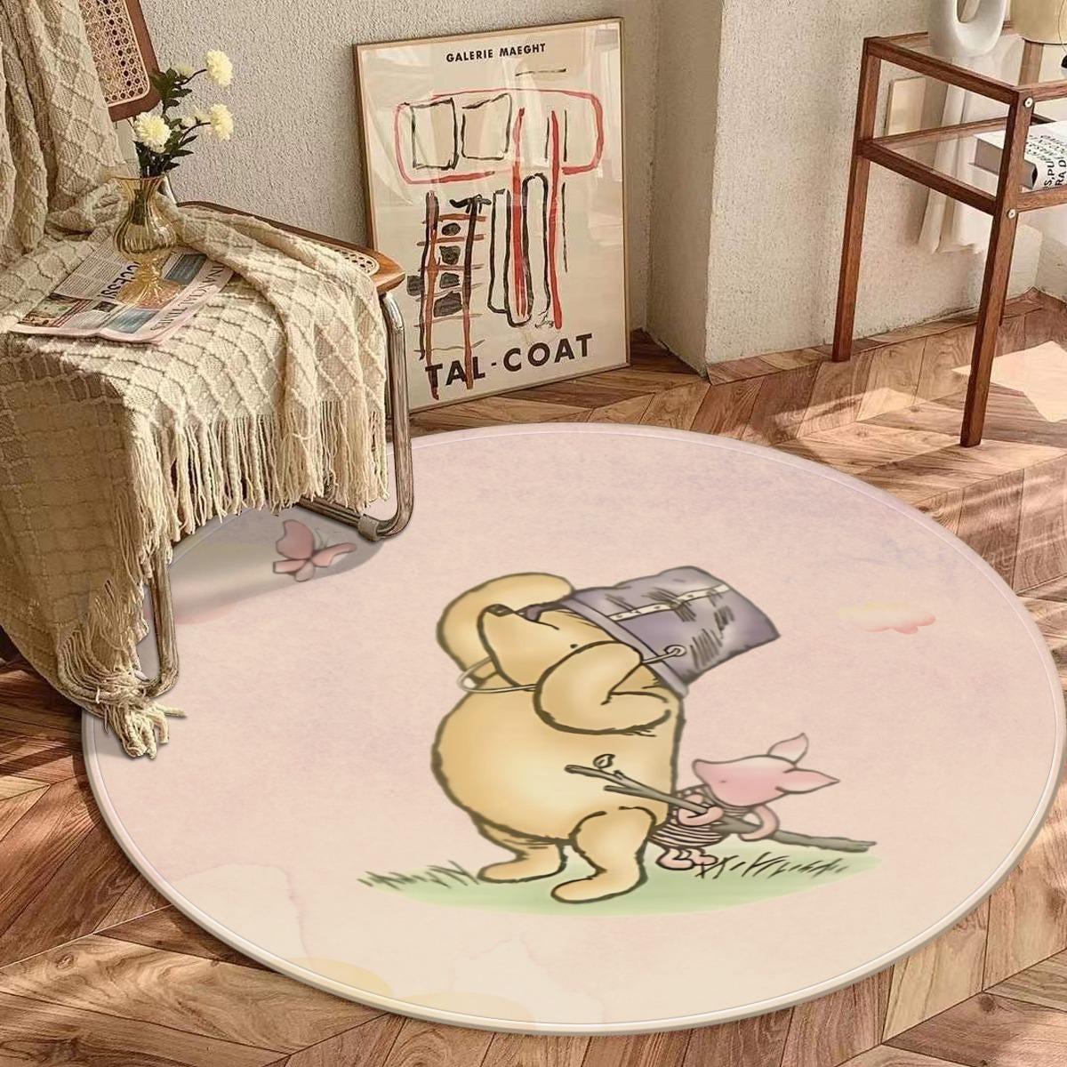Close-up of soft fabric texture on Pooh and Piglet nursery play mat.