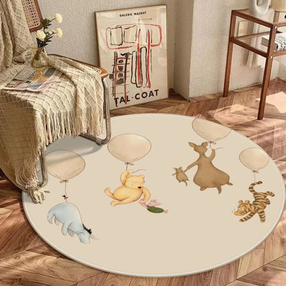Close-up of Pooh and friends balloon illustration on soft nursery play mat.