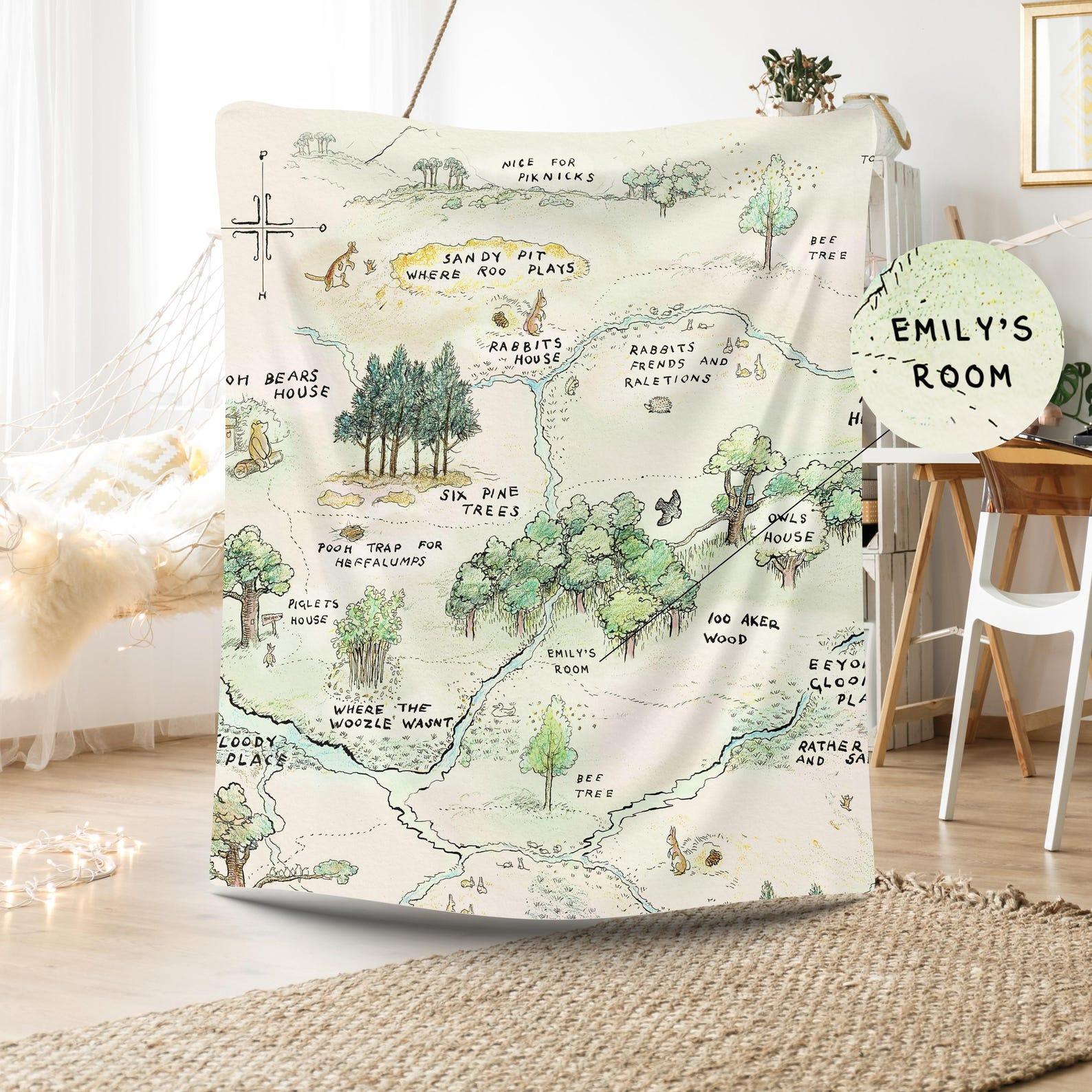 Folded custom Pooh map round play mat, high-quality handmade nursery accent.