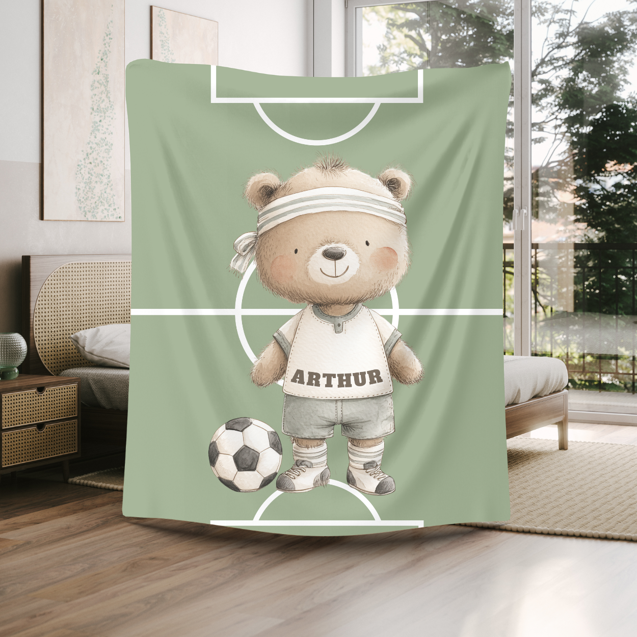 Soccer Bear blanket styled in a fun, sports-themed baby nursery.