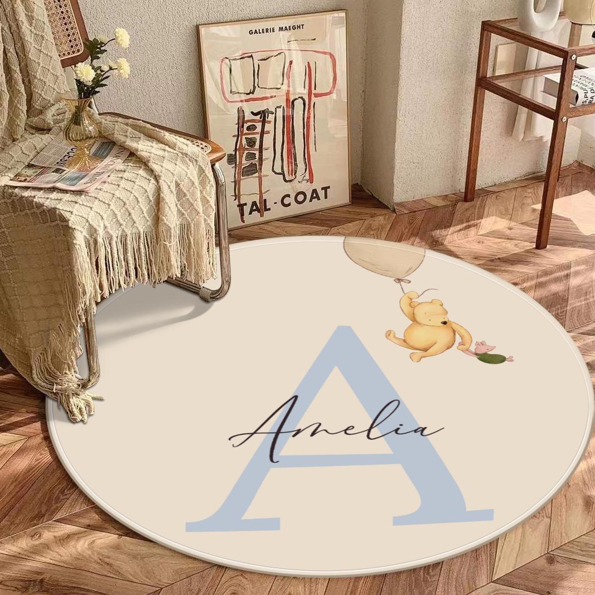 Personalized Winnie the Pooh Adventure round nursery rug with custom initial.Design