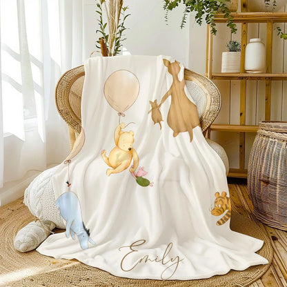 Winnie the Pooh & Buddies blanket styled in cozy, storybook-themed nursery room decor.