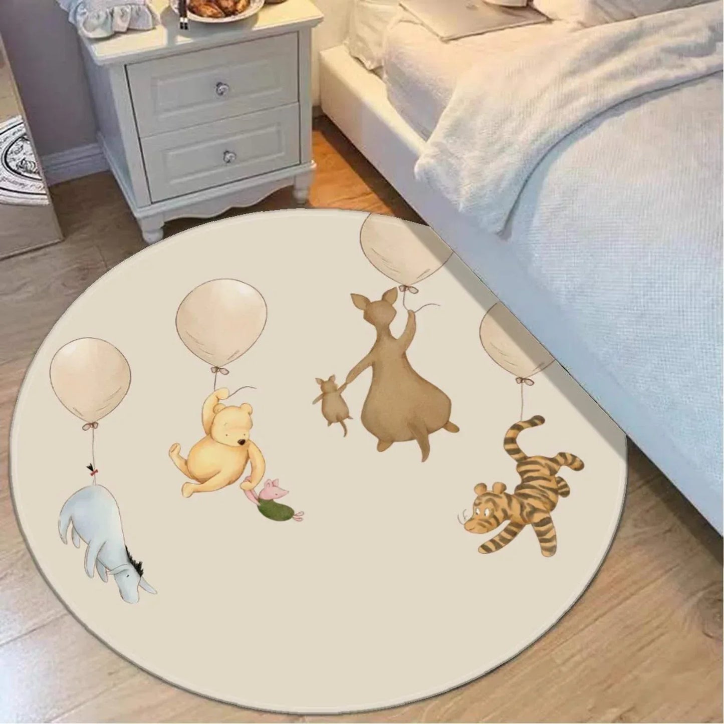 Winnie the Pooh and friends balloon round nursery rug, fun kids floor decor.