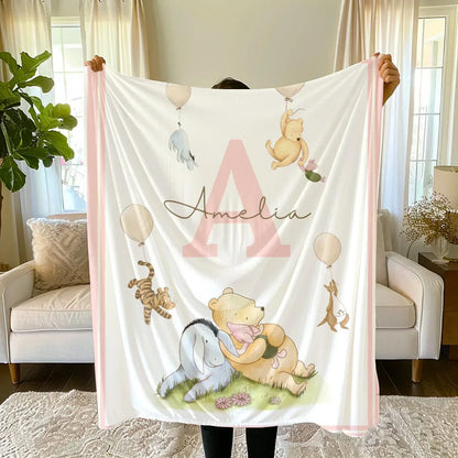 Vintage Winnie the Pooh blanket styled in a nursery, essential cozy decor for storybook theme.