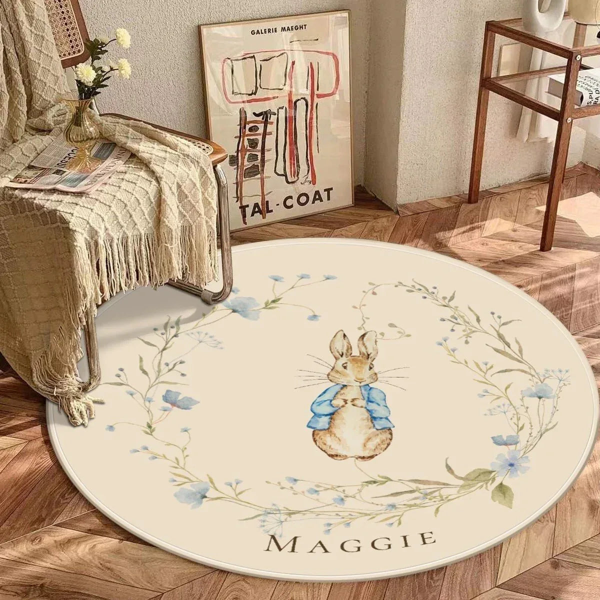 Close-up of floral and bunny garden pattern on soft round nursery rug.